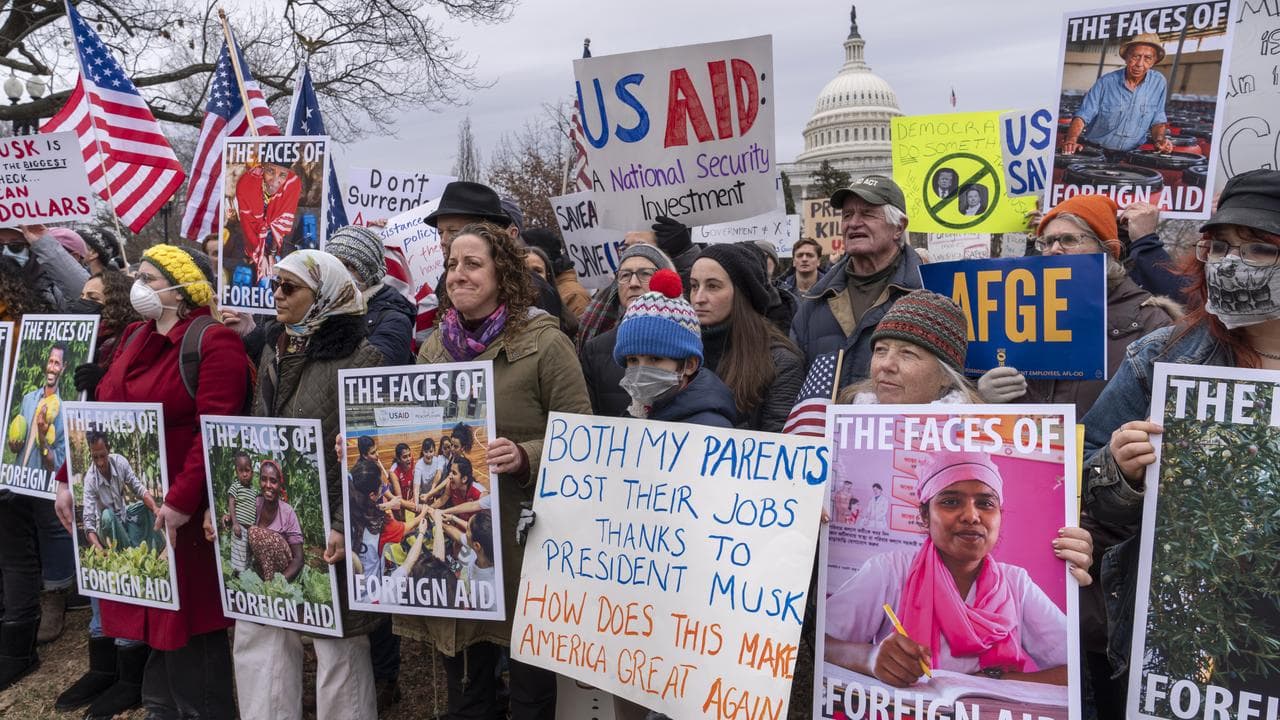Demonstrators rally against the dismantling of USAID
