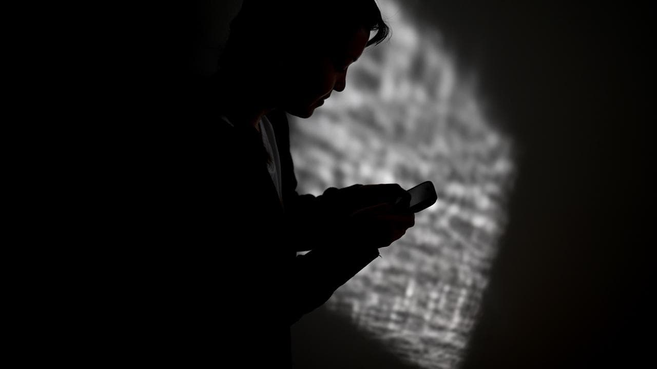 A woman on her mobile phone (file image)