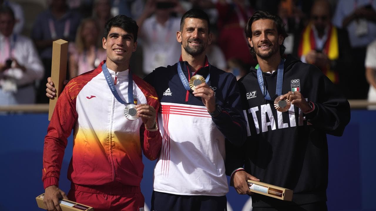 (L-R) Carlos Alcaraz, Novak Djokovic and Lorenzo Musetti.