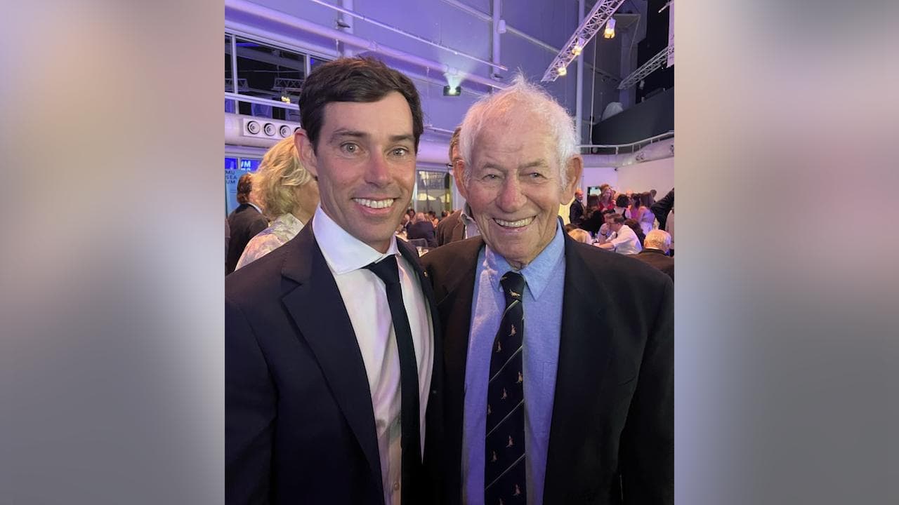 Mathew Belcher with coach Mike Fletcher.