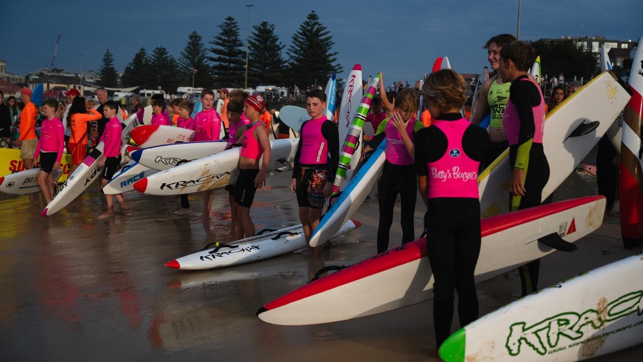 Sydney bathers and surfers paddle out for shark victim Nico Antic