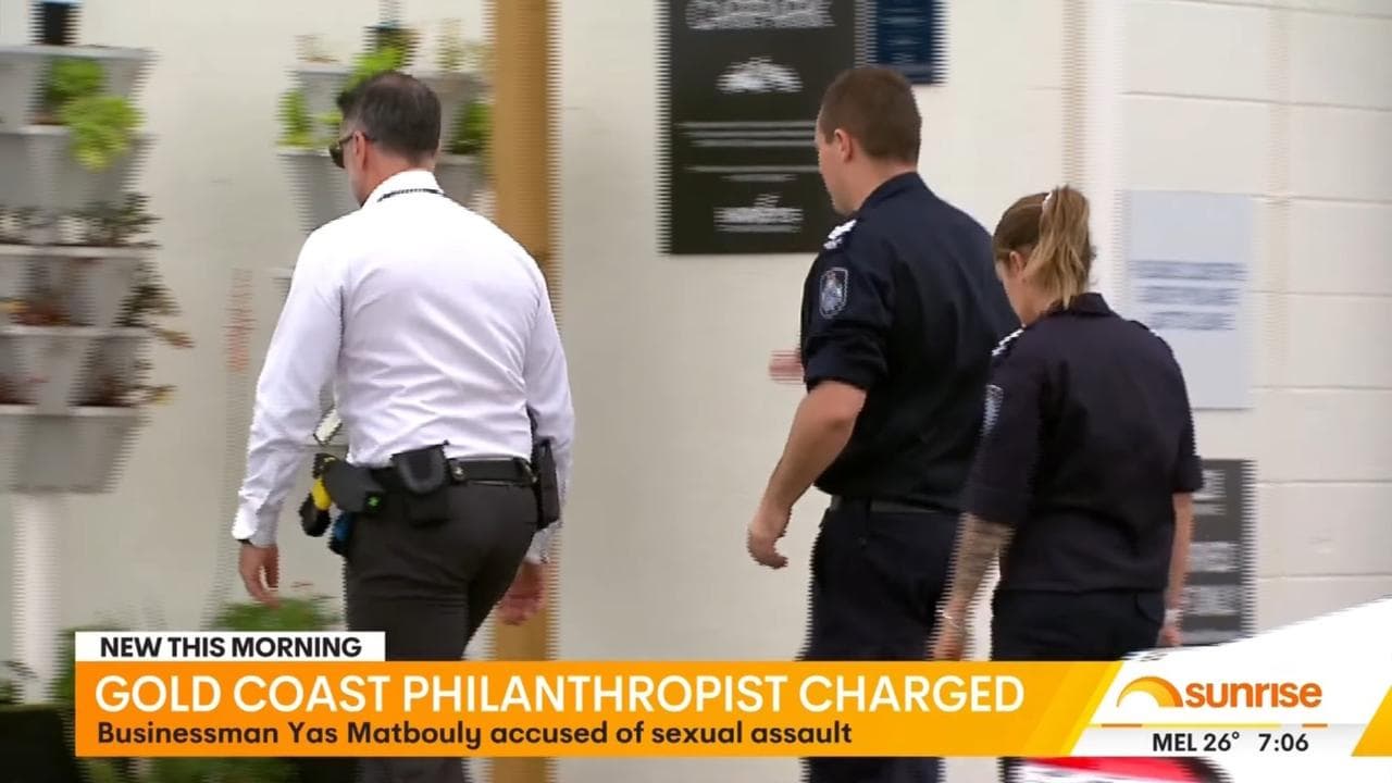 Police at the Serving Our People premises on the Gold Coast