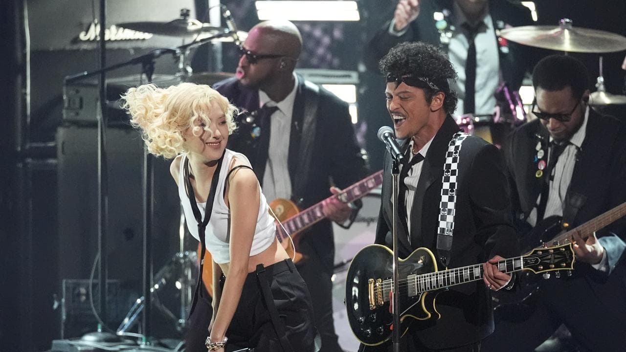 Rose, left, and Bruno Mars