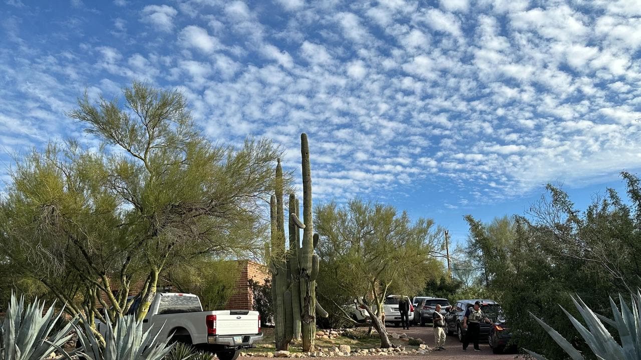 Police outside the home of Nancy Guthrie