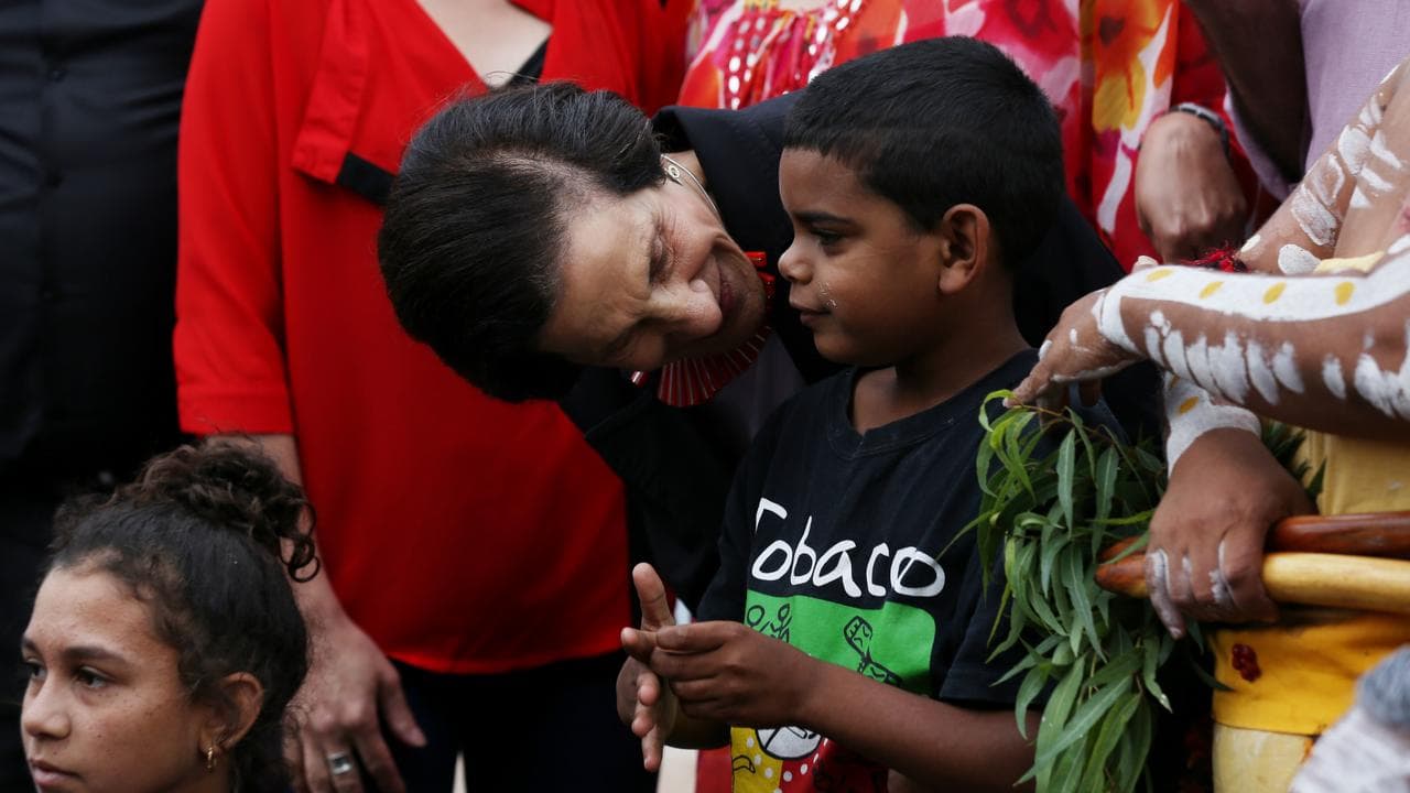 Marie Bashir talks to a young boy in 2014
