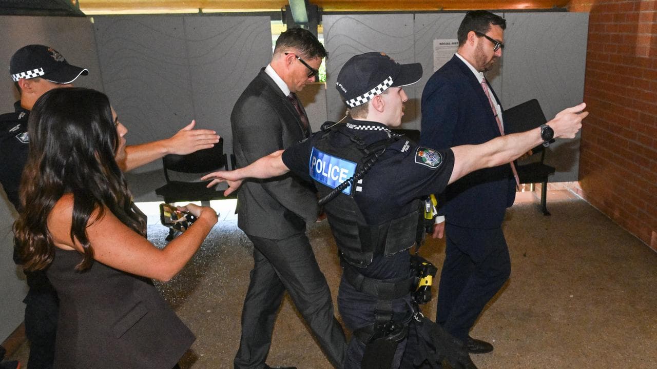 Nathan McKeown escorted by police