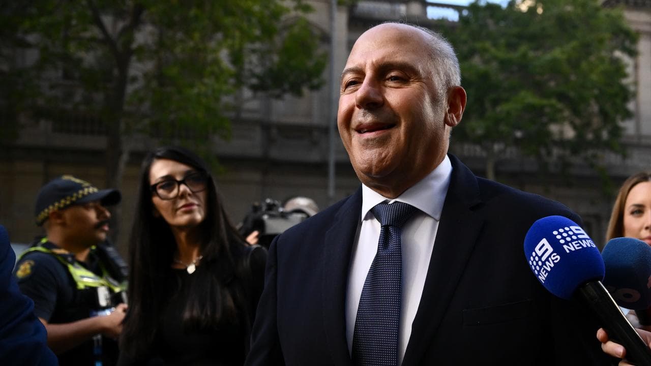 Tony Mokbel with partner at left