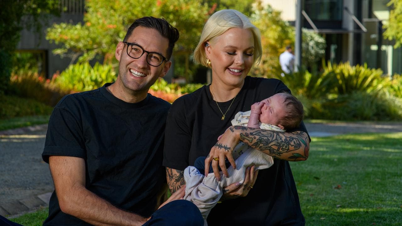 Georgie Purcell and Josh Burns pose with their daughter Lilah