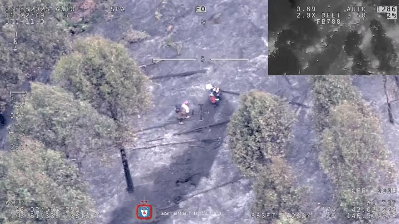 A woman is rescued by a helicopter