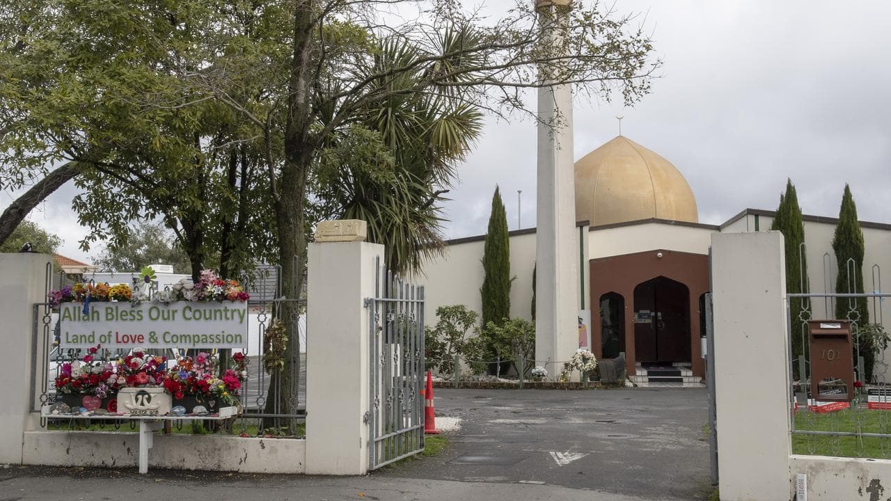 Floral tributes are seen at the Al Nor Mosque in Christchurch