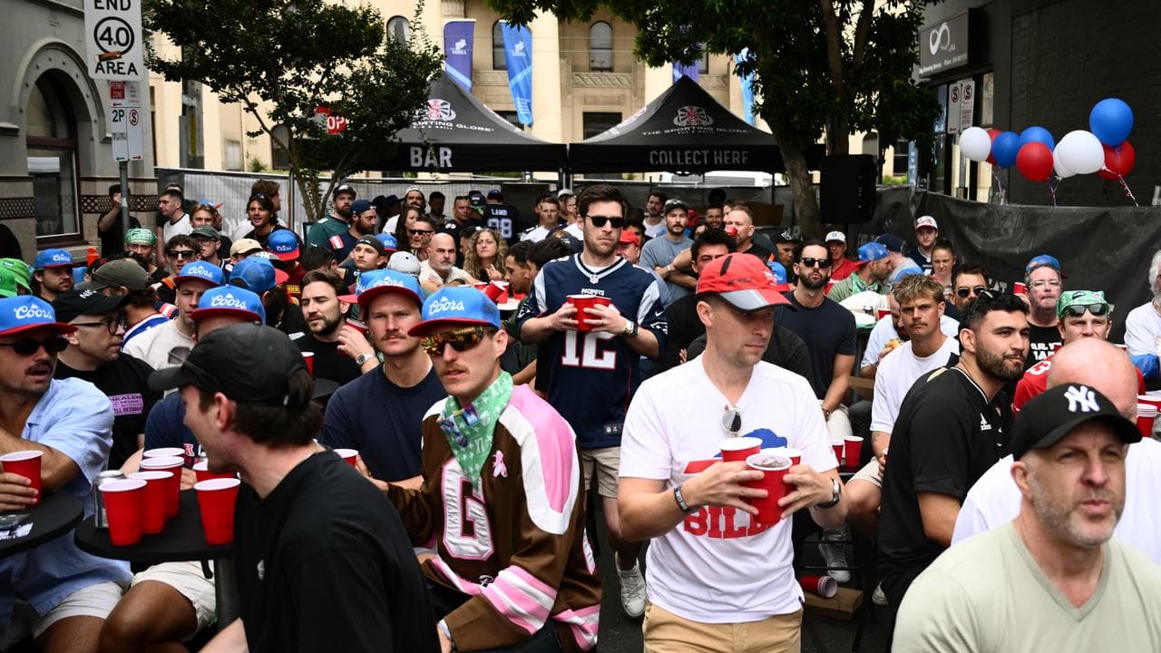 Patrons watch the Super Bowl at a Melbourne Pub