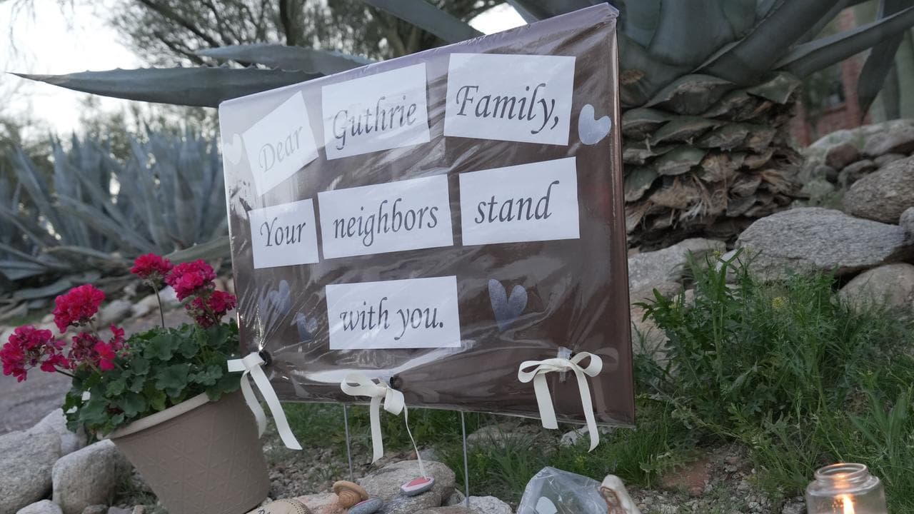 A small vigil grows near Nancy Guthrie‘s house