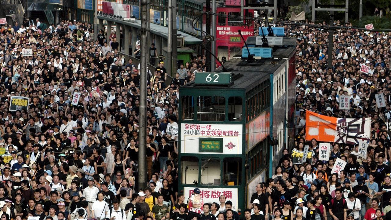 People march to Hong Kong government headquarters