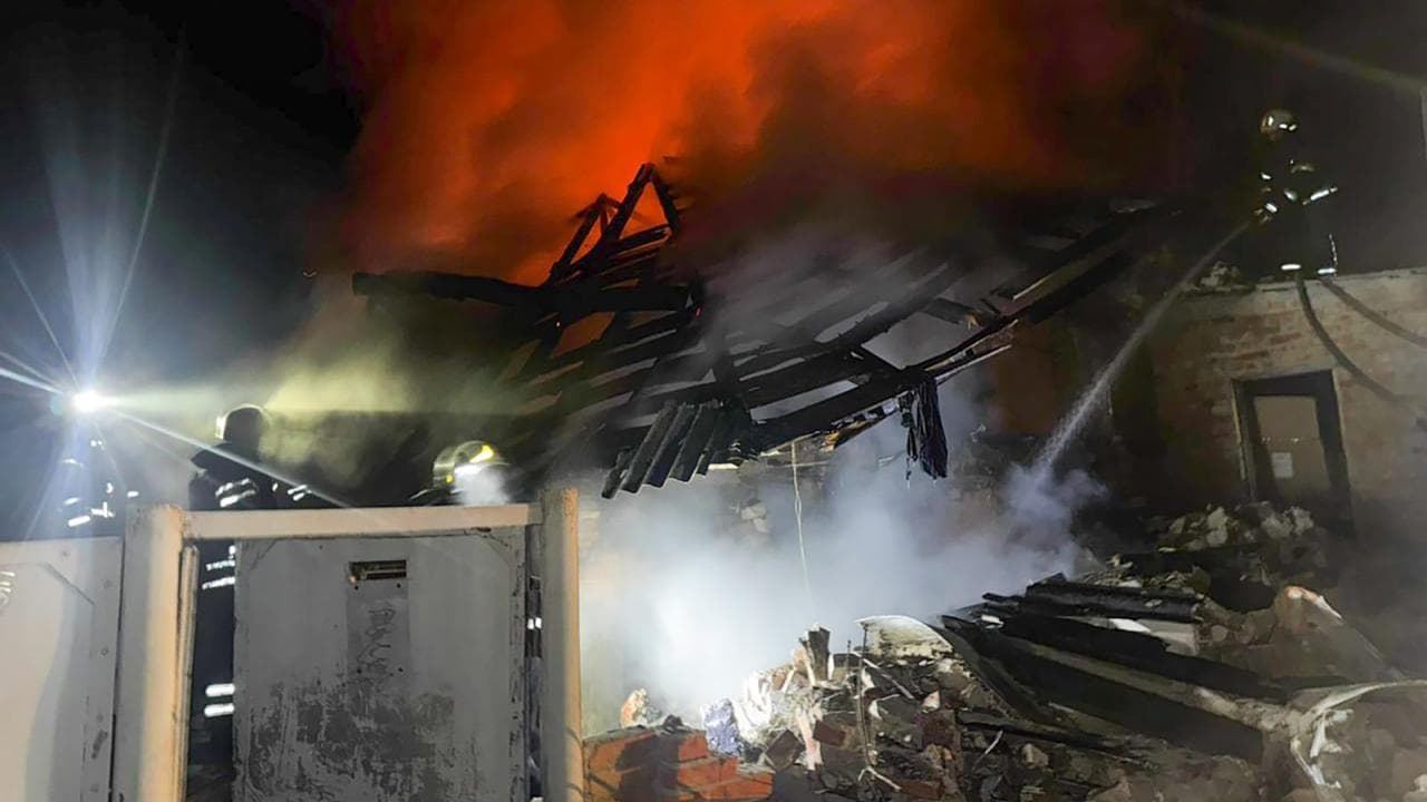A fire at a house after a Russian air attack in Bohodukhiv, Kharkiv