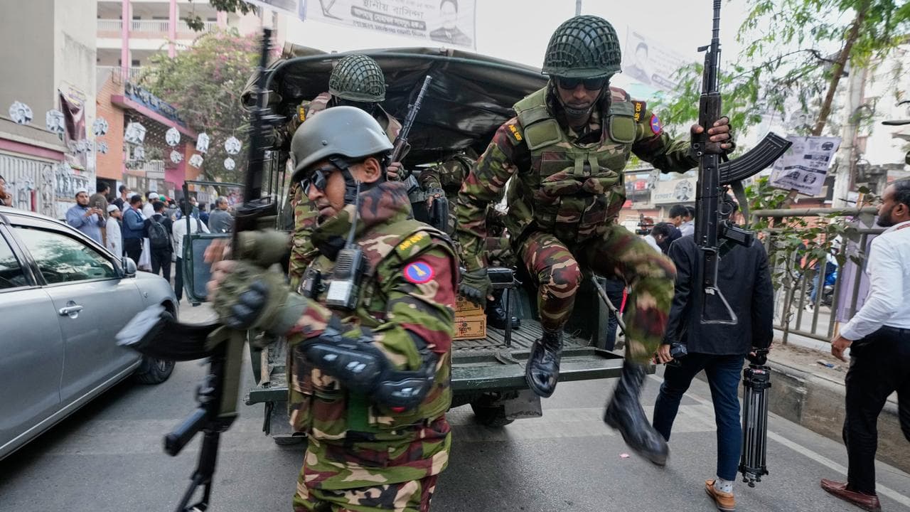 Army personnel outside a polling station in Dhaka, Bangladesh