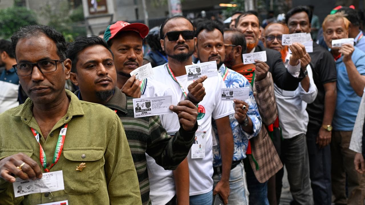 Voters wait to cast ballots in Dhaka, Bangladesh