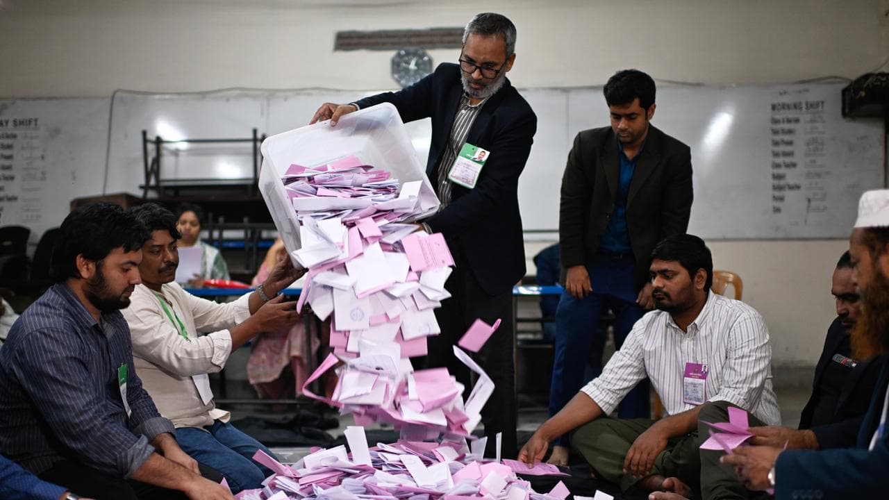 Polling officials count votes in Dhaka, Bangladesh