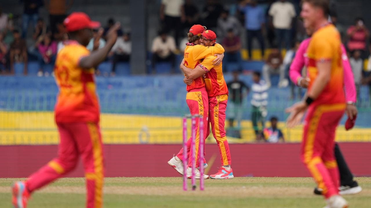 Zimbabwe players celebrate.