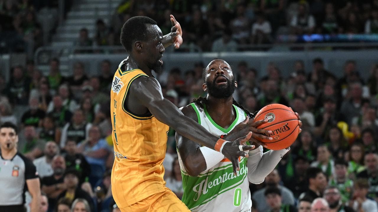 John Brown had a tall order trying to get over Majok Deng.