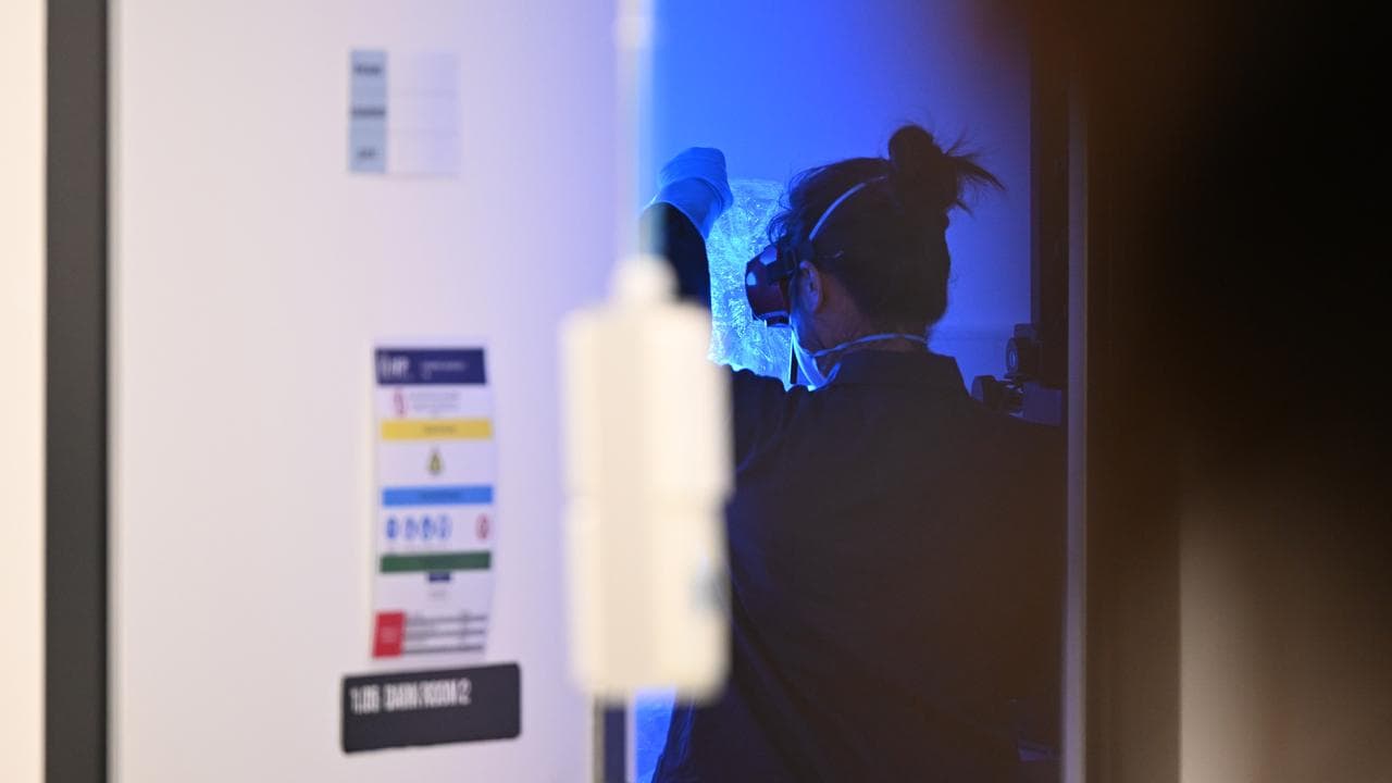 Police at a forensic laboratory