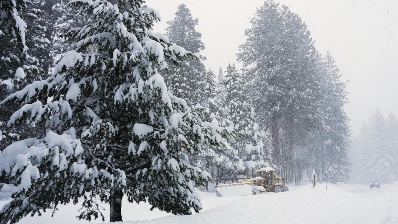 A road is ploughed during a snow storm in Truckee, California