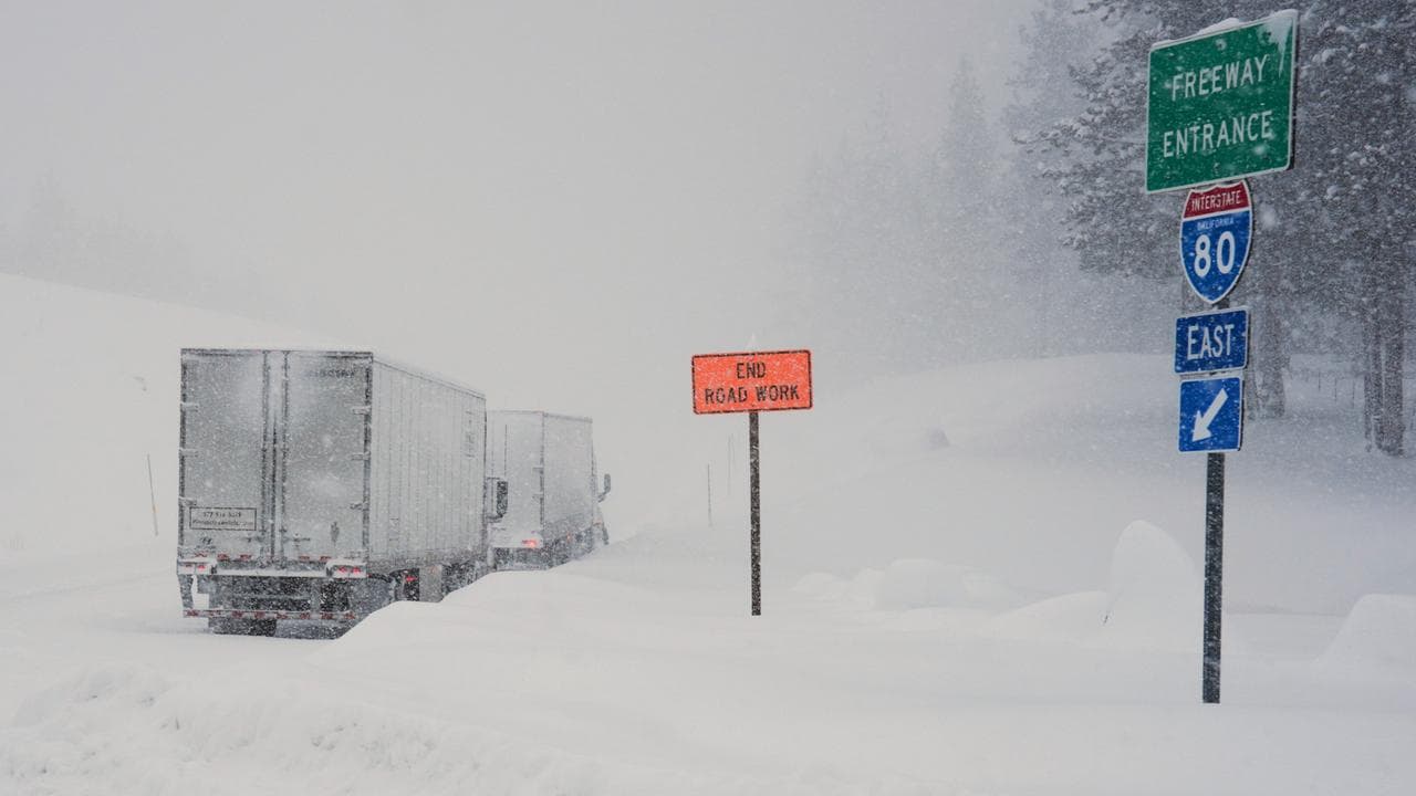 Trucks along Interstate 80 during a storm in Truckee, California