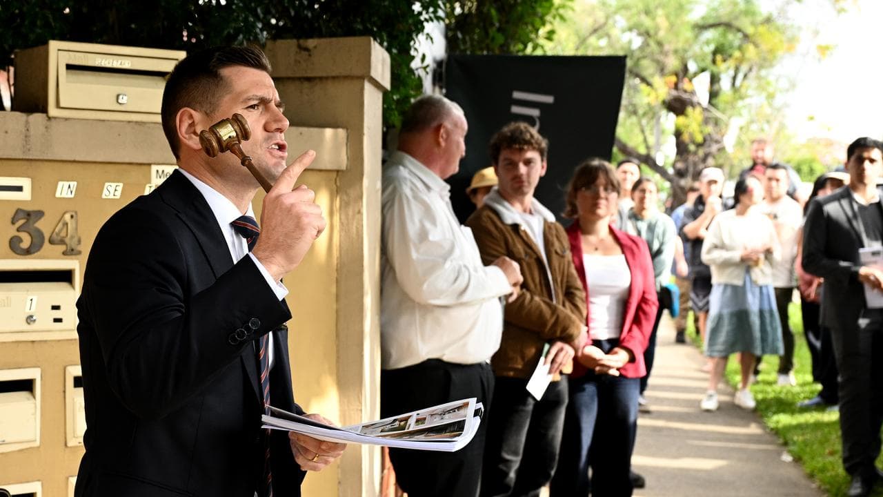 Auctioneer presides over a property auction at Homebush, Sydney