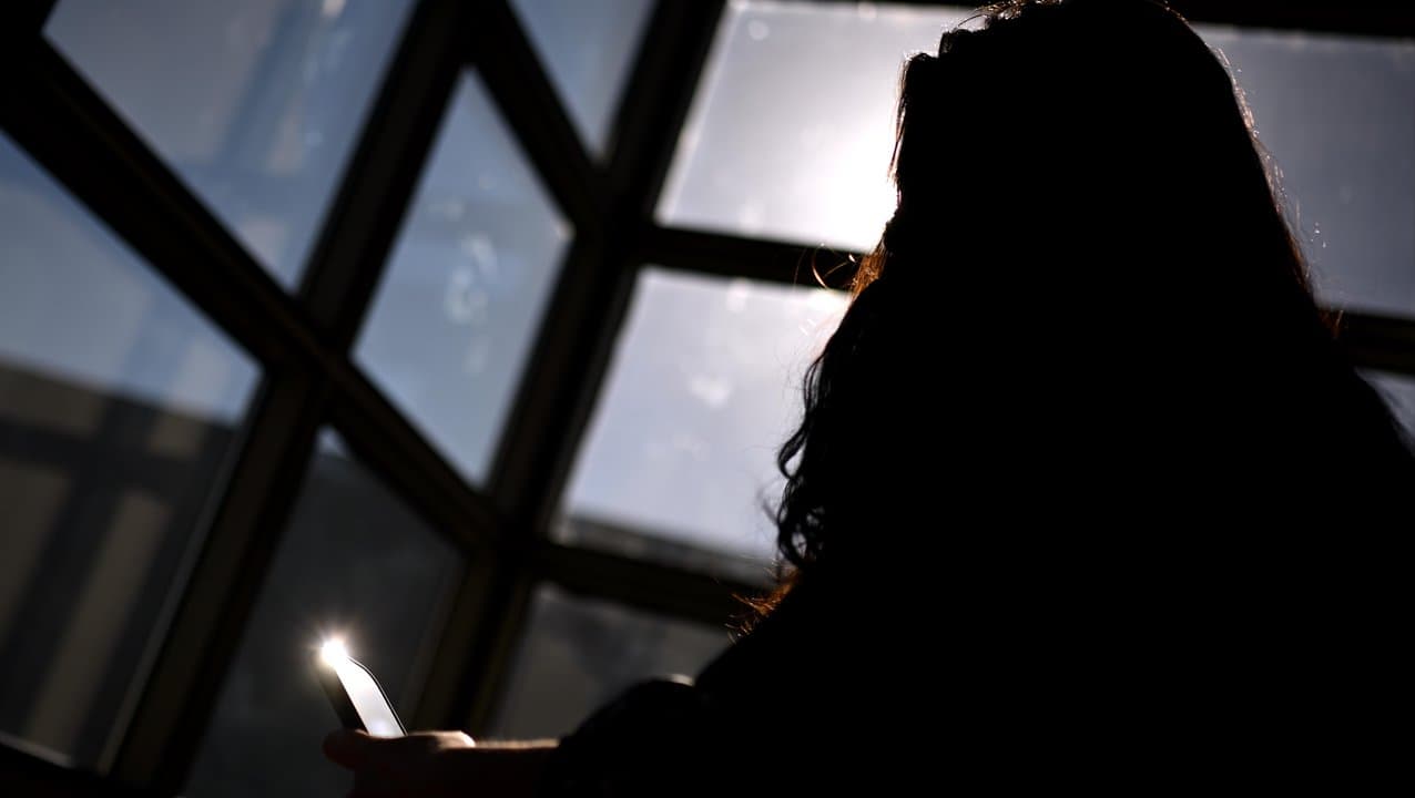 A silhouette of a young woman (file)