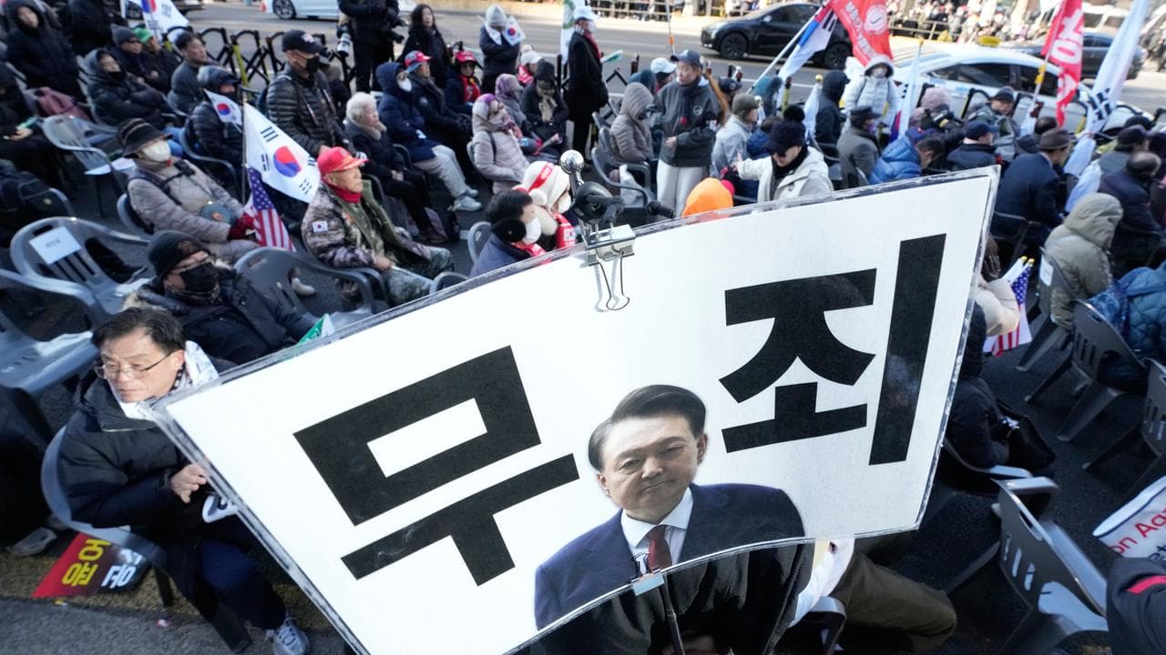 Supporters of former South Korean President Yoon Suk-yeol