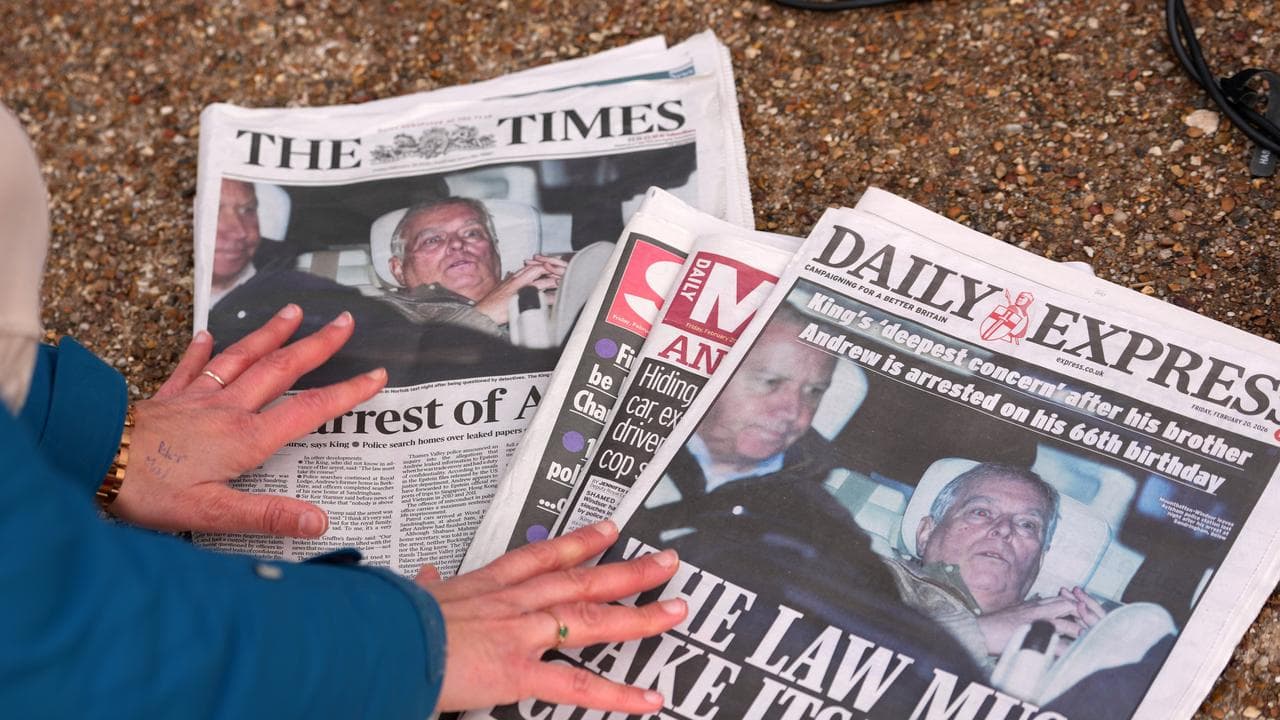 Newspaper front pages about the arrest