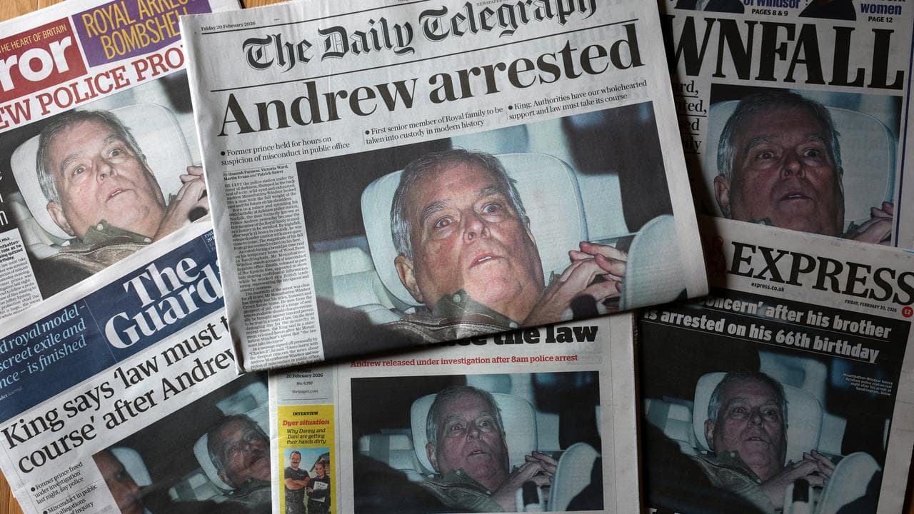 Newspaper front pages detailing the arrest