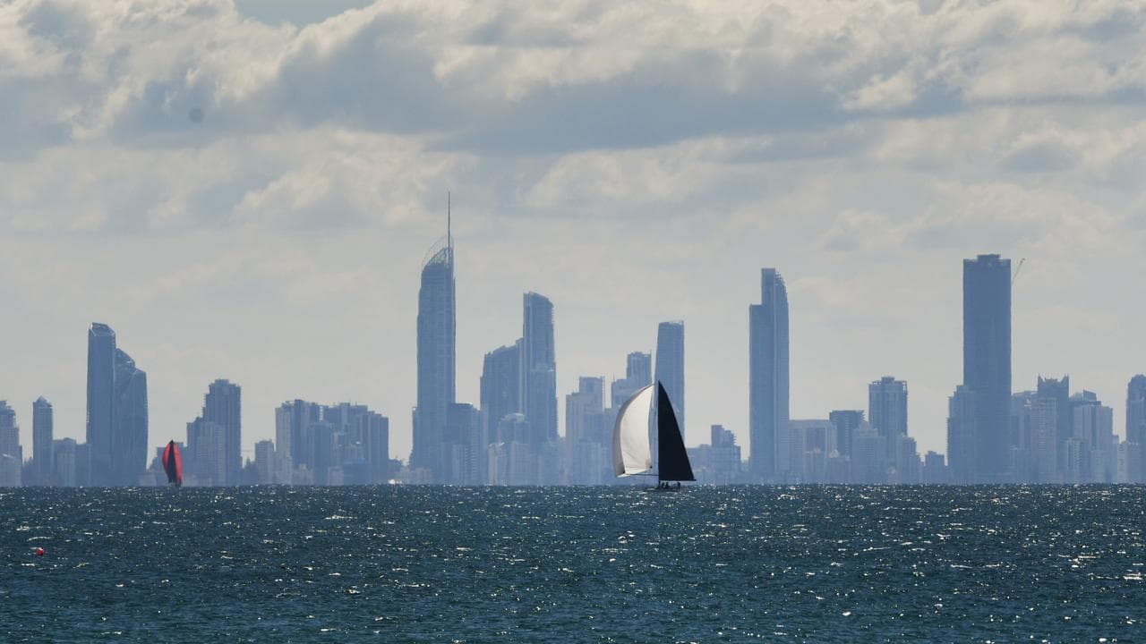 A sailboat along the city skyline on the Gold Coast, Queensland