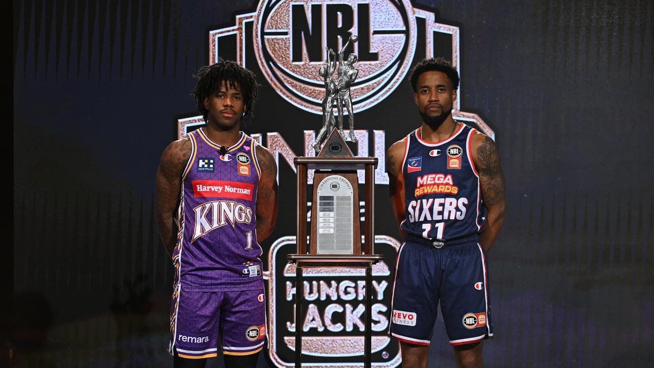 Cotton (r) with NBL MVP runner-up Kendric Davis.