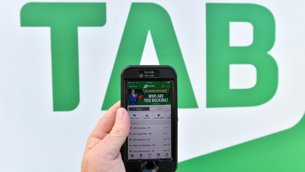 The TAB betting app is seen on a mobile phone (file image)