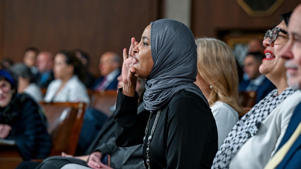 Ilhan Omar reacts as Donald Trump gives his State of the Union address