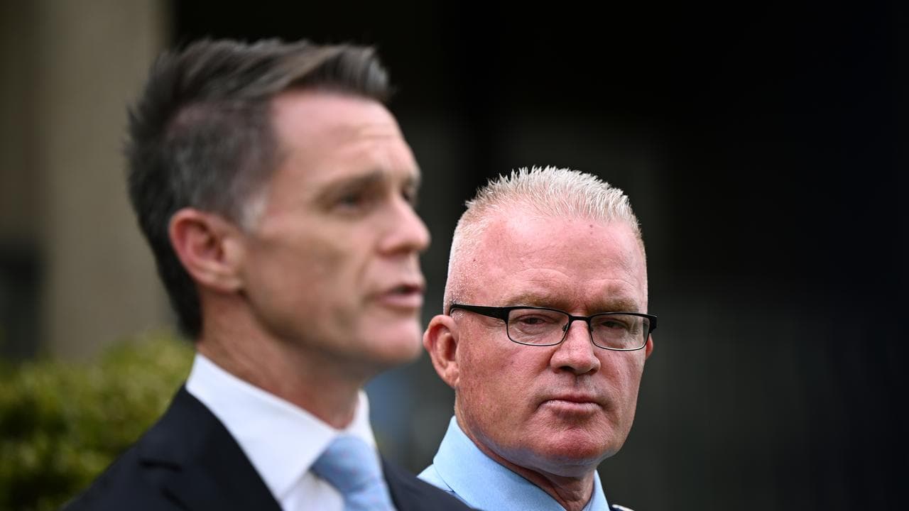 Premier Chris Minns and NSW Police Commissioner Mal Lanyon (right)