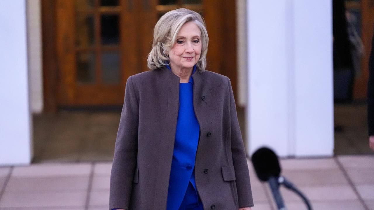 Hillary Clinton speaks to reporters in Chappaqua after testifying