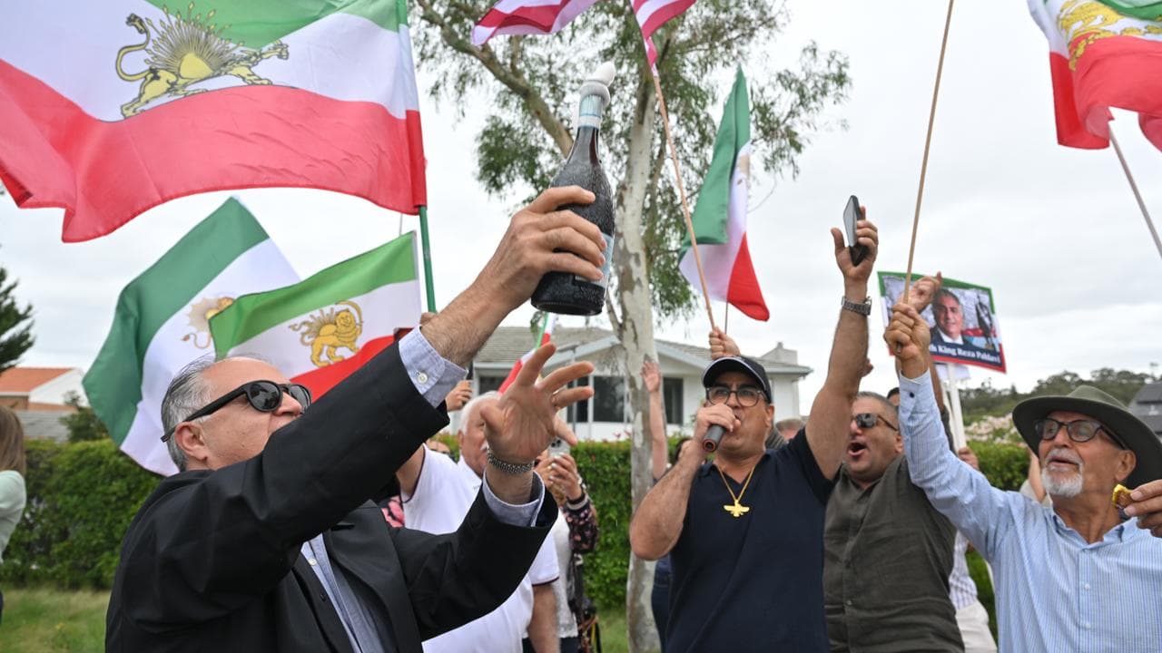 Iranian Australians celebrate outside Iran’s embassy,