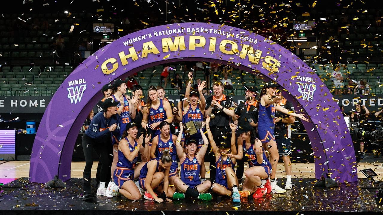 Townsville Fire players celebrating.