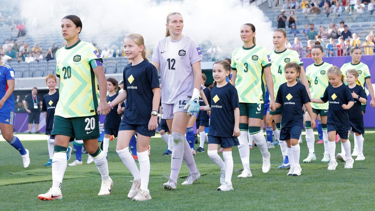 Matildas enter the field.