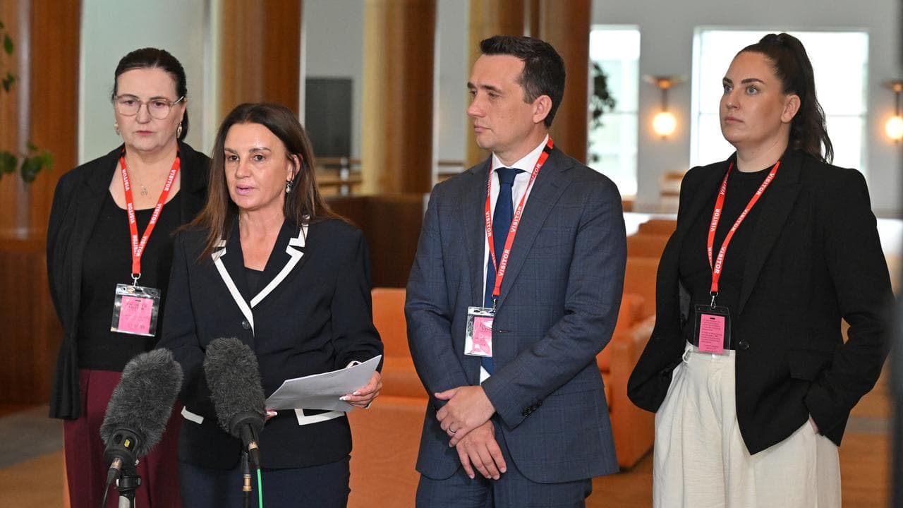 Senator Jacqui Lambie with lawyers from JGA Saddler