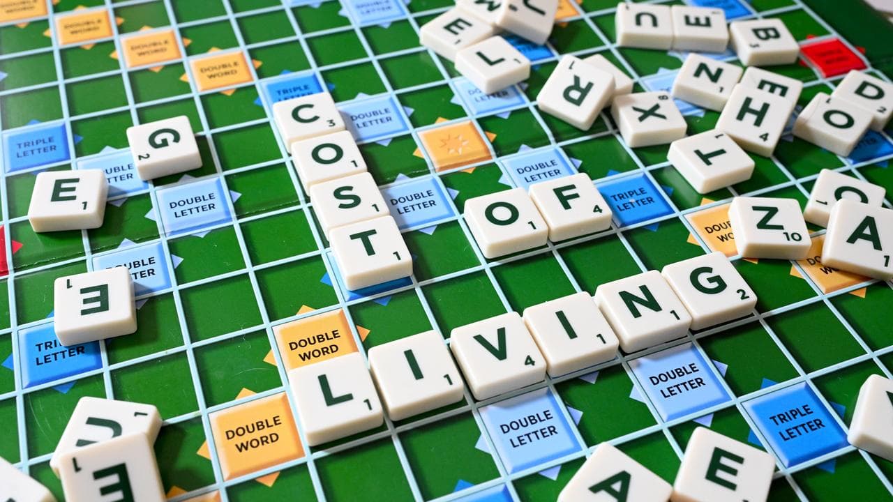 The words ‘Cost of Living’ on a Scrabble board (file image)
