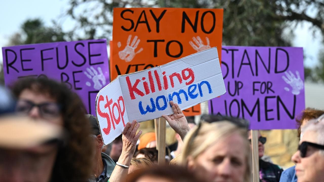 A rally in Canberra calls for action to end violence against women