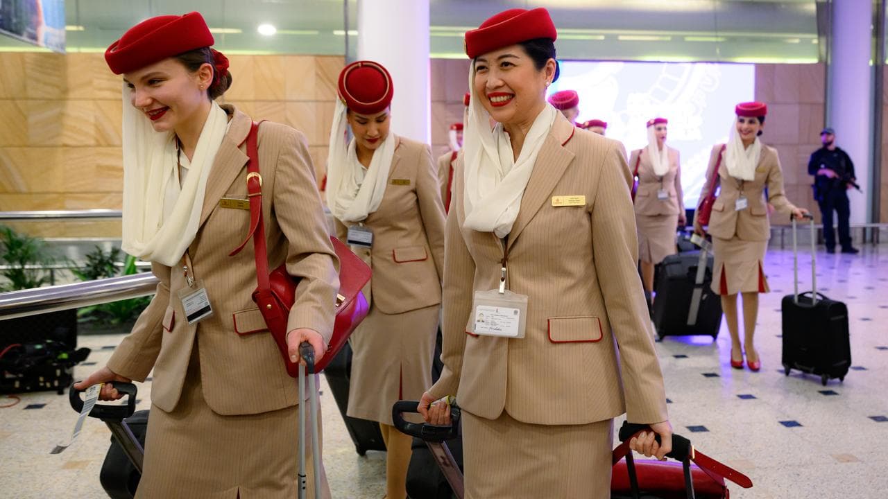 Passangers from Dubai arrive at Sydney International Airport