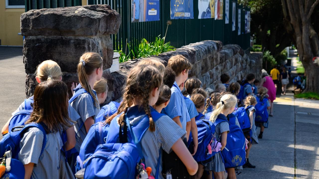 Students waiting to be picked up by their parents