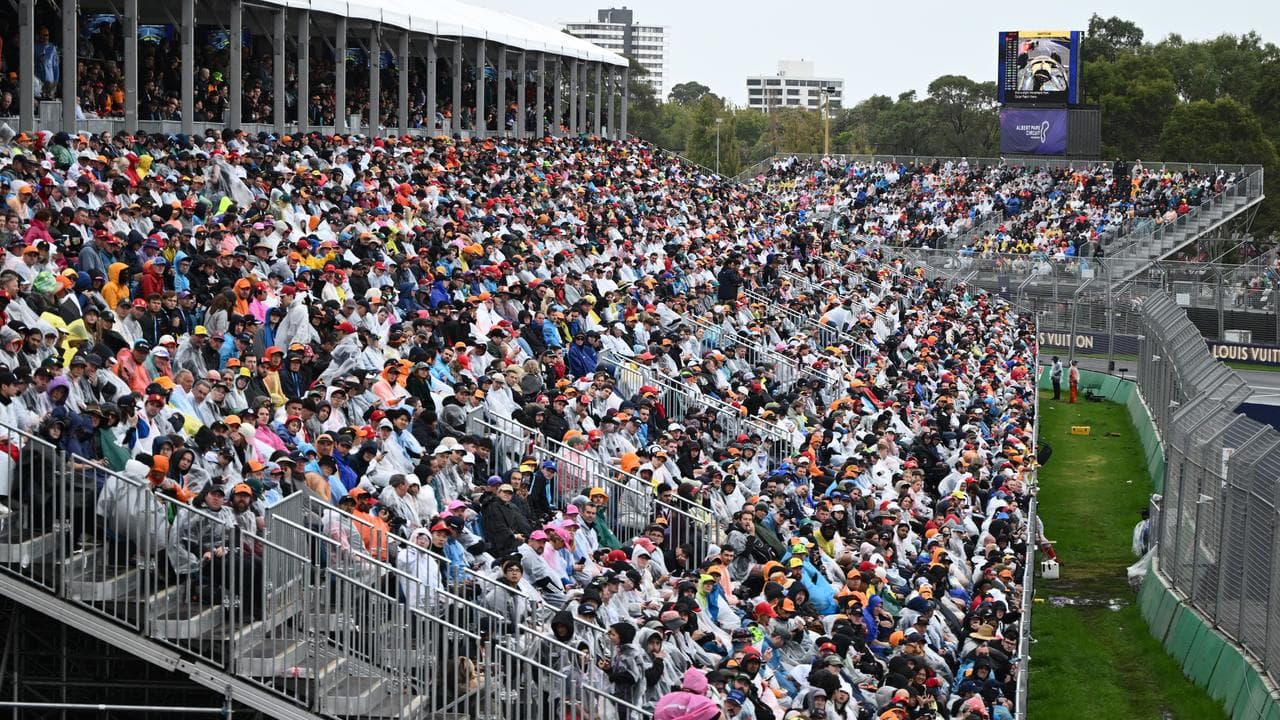 A huge crowd watches the Australian Formula One Grand Prix