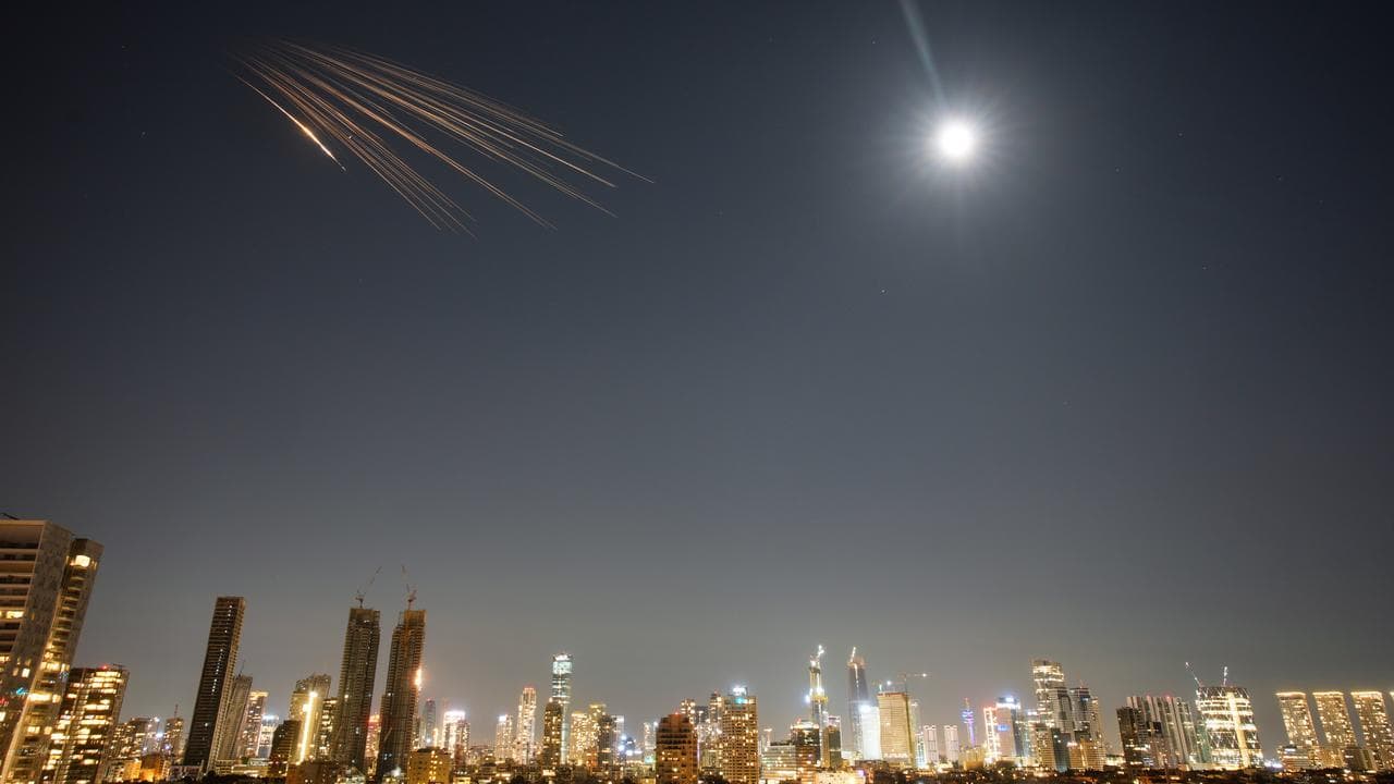 Missiles launched from Iran are seen in the sky over central Israe