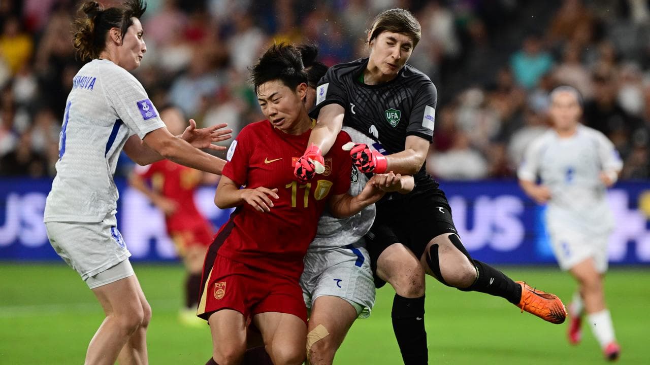 Three players clash.