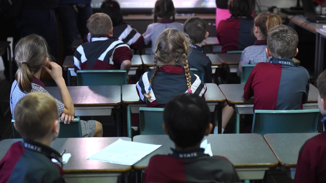 Children sit in a classroom (file)