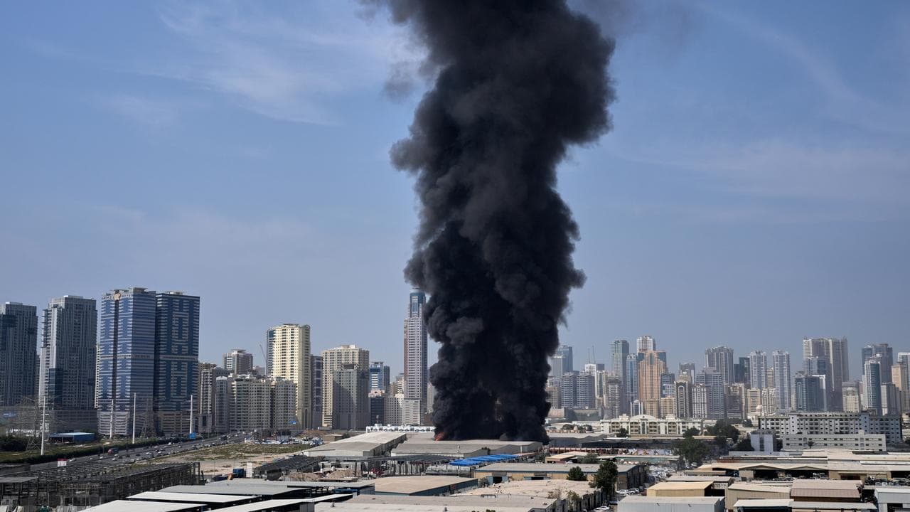 Smoke rises from the industrial area of Sharjah City in the UAE
